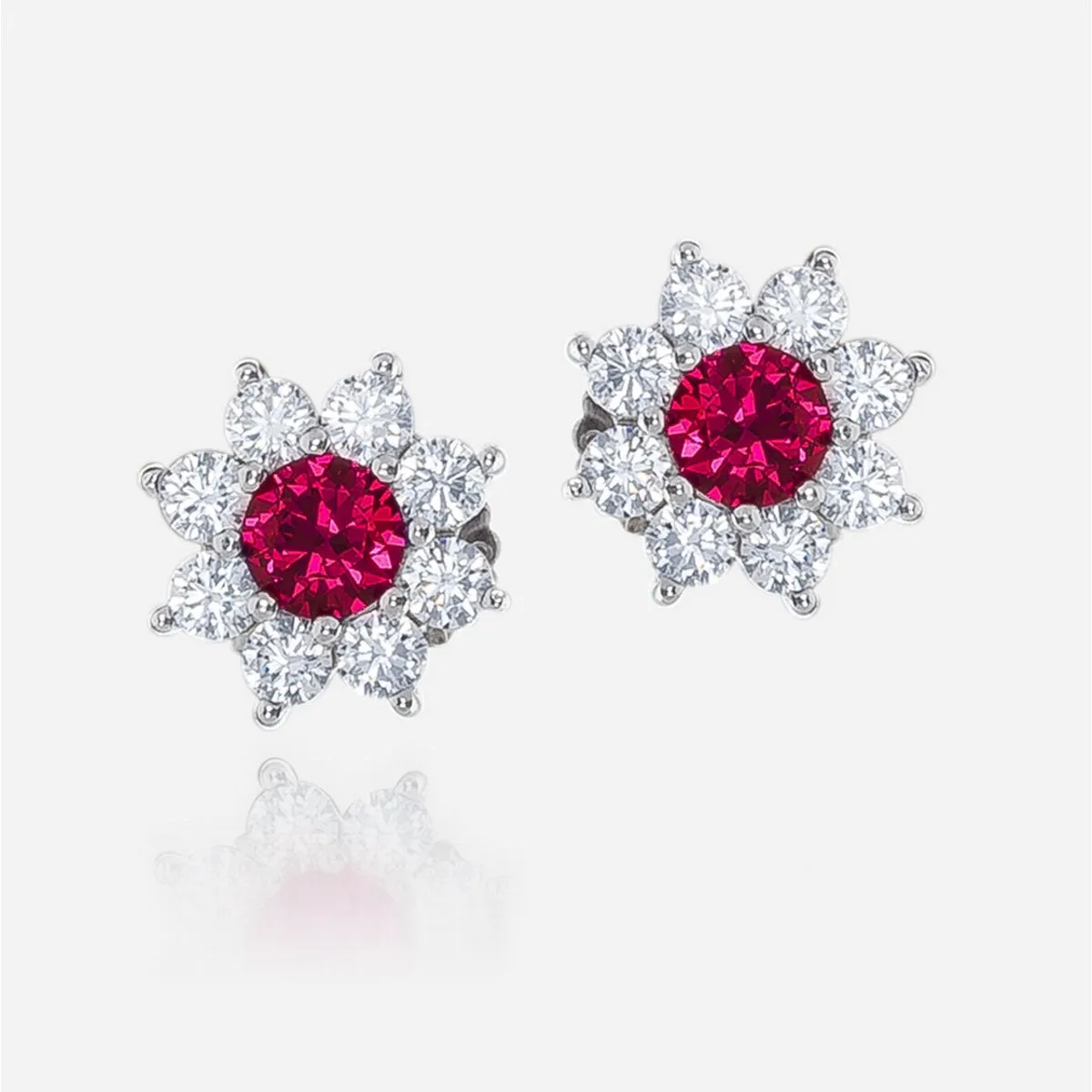 classic floral earring cluster with large zirconia centrepiece in fine sterling silver with a red stone