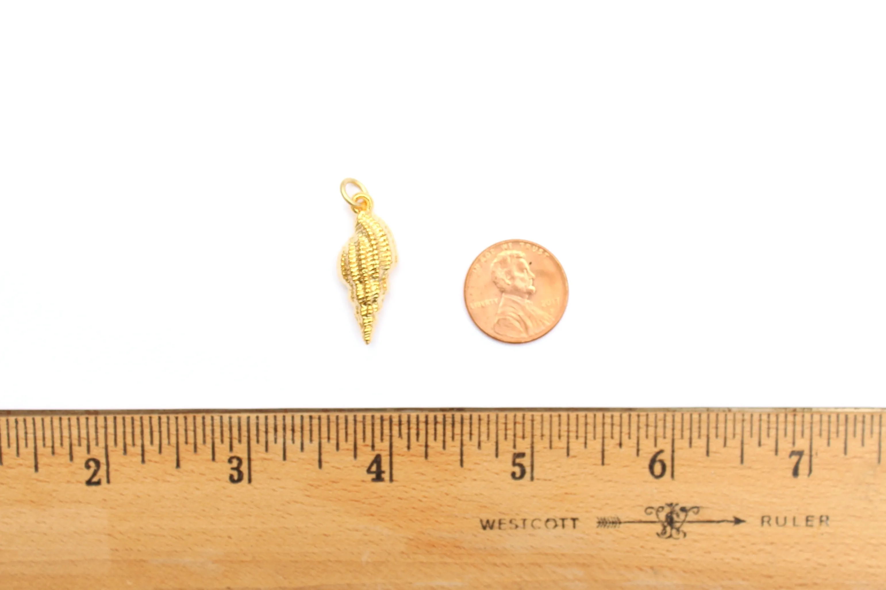 Spiral Shell Charm in Britannium – Oceanic Elegance in Metal Form